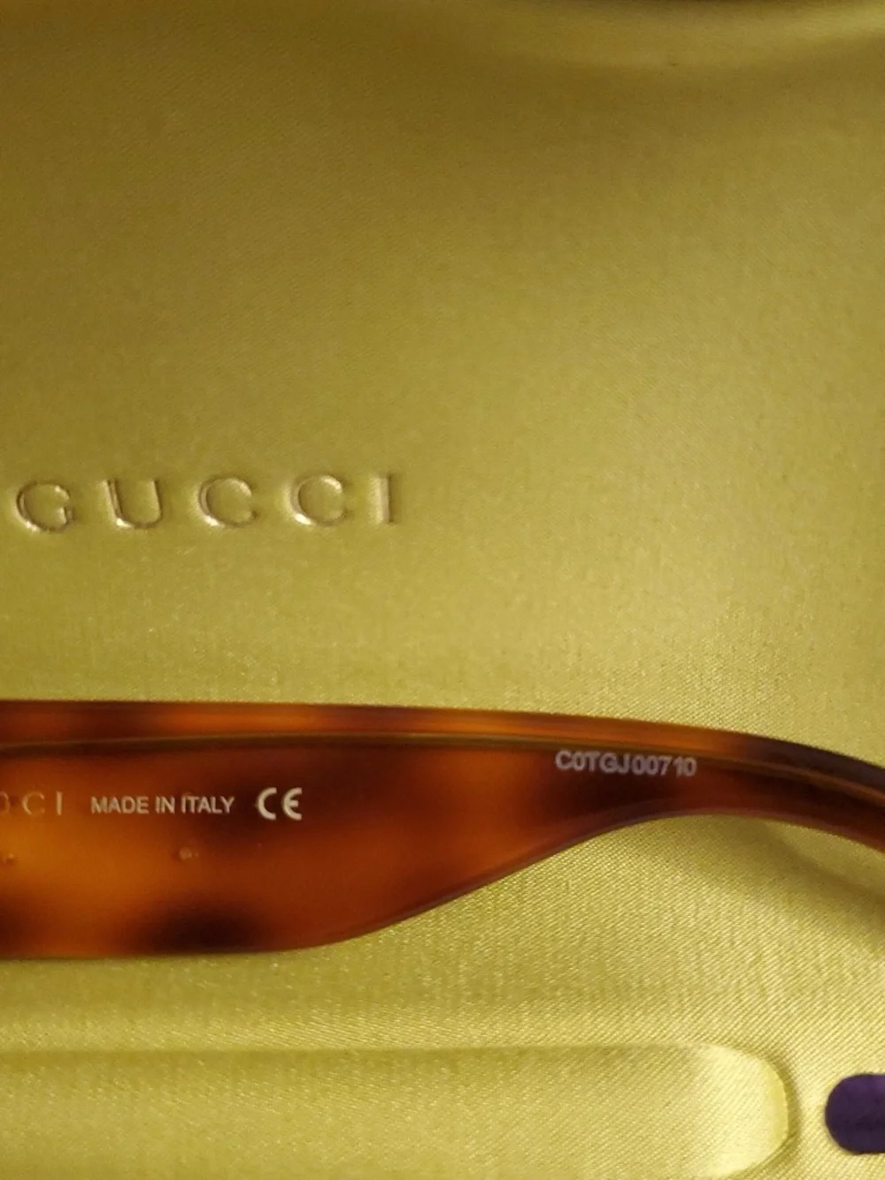 Gucci Women's red tortoise Cat-Eye Sunglasses